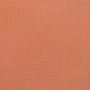 May include: A close-up of a solid coral orange fabric with a subtle woven texture.