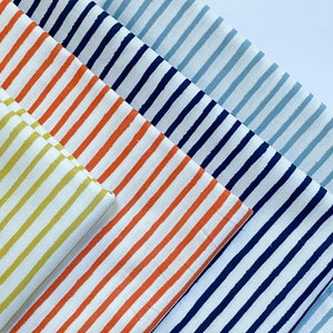 Festive Stripe by Rifle Paper Co for Cotton and Steel Fabrics, organic brush stroke stripes printed on cotton poplin