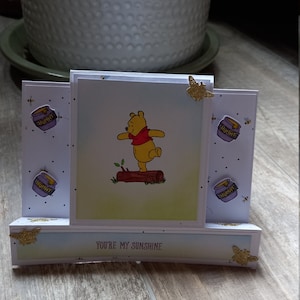Winnie de poeh, Je bent mijn zonneschijn, middenop stap wenskaart