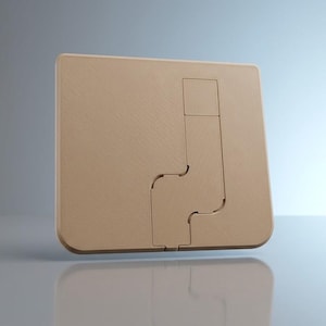 Op de afbeelding: Een vierkante, beige wandplaat met een centraal, verzonken, L-vormig uitgesneden gedeelte. Het oppervlak heeft een fijn gestructureerde afwerking en het ontwerp bevat een kleiner vierkant segment bovenaan het verticale kanaal.