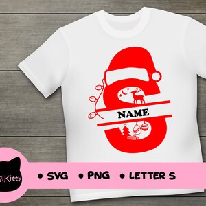 May include: Red Christmas letter S with a Santa hat, a reindeer, a Christmas tree, and ornaments. The letter is split in half with a banner that says "NAME".