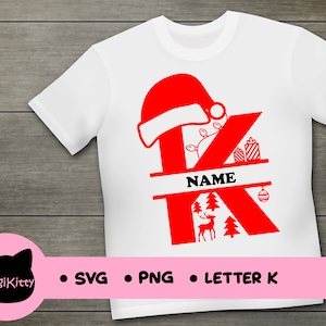 May include: Red Christmas letter K with a Santa hat, a reindeer, and a Christmas tree. The letter is on a white t-shirt with the text "NAME" in black.
