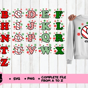 May include: A set of 26 alphabet letters in a Christmas theme. Each letter is decorated with red and green candy cane stripes, green and white zigzags, or red and white stripes. The letters are surrounded by small red and green snowflakes. The letters are available in SVG and PNG formats. The image also shows a white sweatshirt with a red and white candy cane letter C and the name Clara.