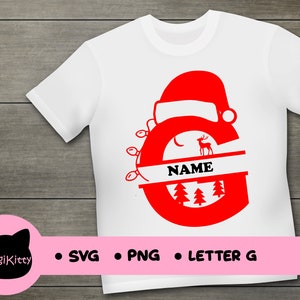 May include: Red Christmas letter G with a Santa hat, lights, and a reindeer. The letter is surrounded by pine trees and a banner with the word "NAME".