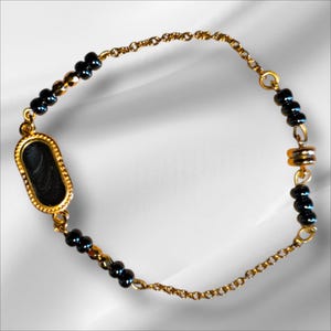 elegant pearl and link bracelet