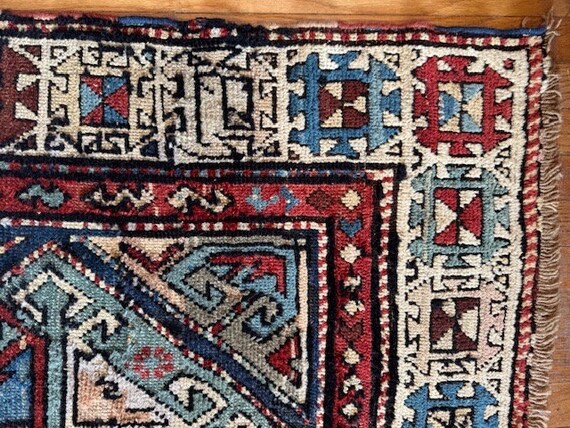 アンティークのアンティーク風コーカサス絨毯、1900 年頃、3'4x9'1