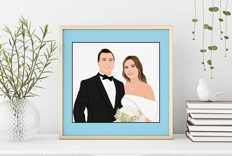 May include: A framed illustration of a couple in wedding attire. The man is wearing a black tuxedo with a bow tie and the woman is wearing a white dress with a bouquet of flowers.
