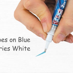 Glue goes on blue and dries clear.