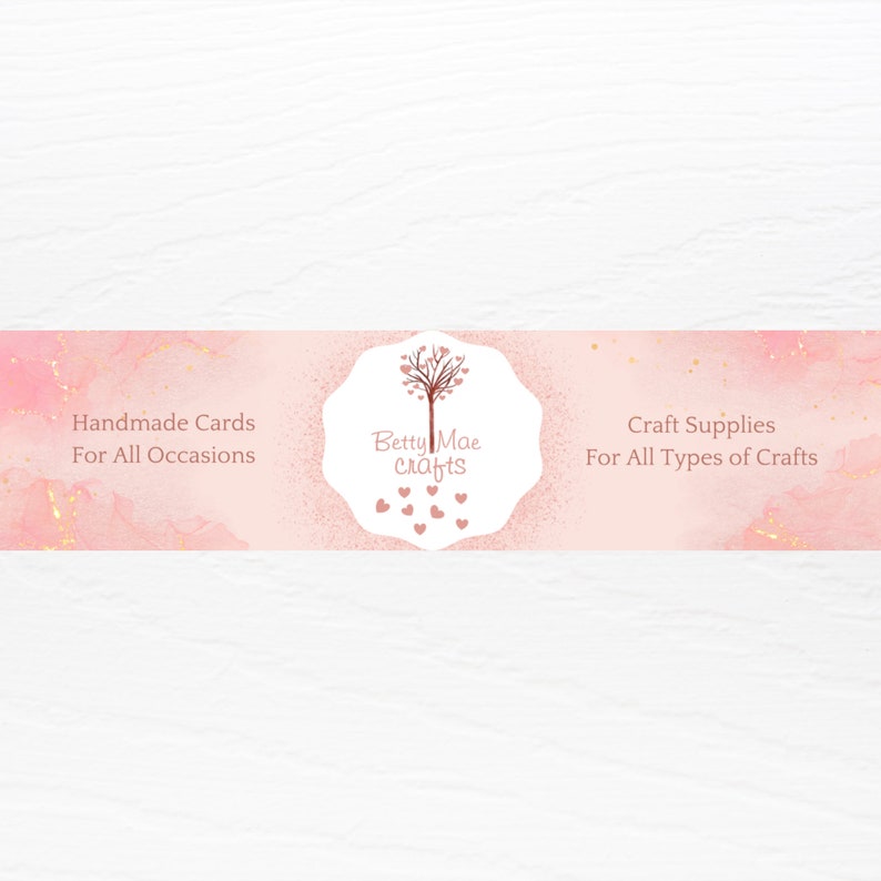 May include: A pink and gold banner with the text "Handmade Cards For All Occasions" on the left, "Betty Mae crafts" in the center with a tree and hearts, and "Craft Supplies For All Types of Crafts" on the right.