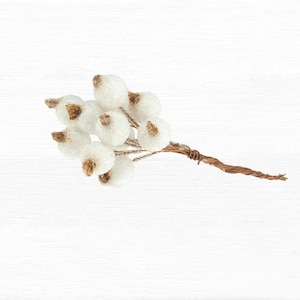 May include: A sprig of artificial berries with white, textured spheres and brown accents. The berries are clustered on a brown, twisted wire stem, creating a natural, decorative element. Suitable for seasonal crafts and home decor.
