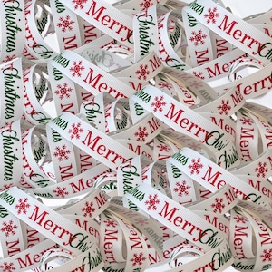 Weißes Ripsband mit frohem Weihnachtsmotiv, 16 mm Breite, 1mtr Länge, Für Geschenkverpackungen und alle Weihnachtsarbeiten.