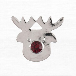 May include: Silver reindeer charm with a red rhinestone nose.