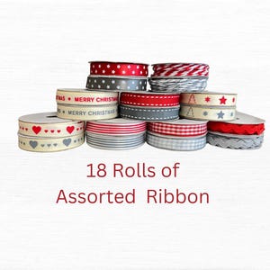 May include: A collection of 18 rolls of assorted ribbon. The ribbons display patterns including hearts, stars, stripes, and gingham. Some rolls have the text "Merry Christmas". The ribbons are in red, white, grey, and cream colours.