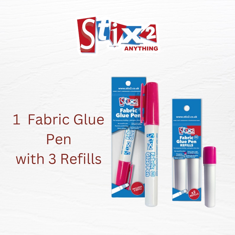 May include: A white fabric glue pen with a pink cap and a pink refill. The pen is labeled "Stix2 Fabric Glue Pen". The image also shows two white fabric glue pen refills labeled "Stix2 Fabric Glue Pen Refills".