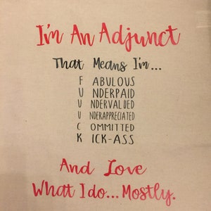 May include: A beige tote bag with the text "I'm An Adjunct That Means I'm... FABULOUS UNDERPAID UNDERVALUED UNDERAPPRECIATED COMMITTED KICK-ASS And Love What I do... Mostly." printed in black and red.