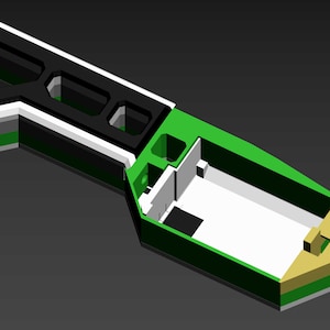 Pode incluir: Um modelo 3D de um objeto preto e branco com um interior verde e dourado. O objeto tem uma s&eacute;rie de furos hexagonais na parte superior e um interior oco.