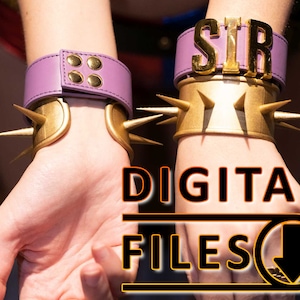 May include: Two purple and gold bracelets with spikes. The bracelet on the left has a plain purple band and the bracelet on the right has a purple band with the word "SIR" in gold letters.