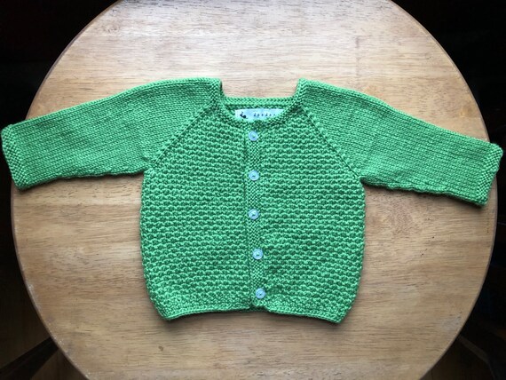 green baby sweater
