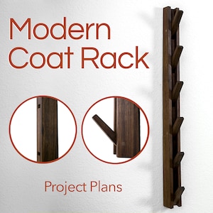 May include: A modern coat rack made of dark wood with five hooks. The rack is mounted to a white wall. The text "Modern Coat Rack" and "Project Plans" is visible in the image.