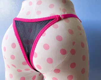 Malha preta com calcinha ou body rosa choque