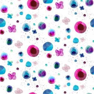 May include: A seamless pattern featuring watercolor-style illustrations on a white background. The design includes vibrant magenta circles with dark centers, various shades of blue circular shapes, and small light purple four-petaled flowers.