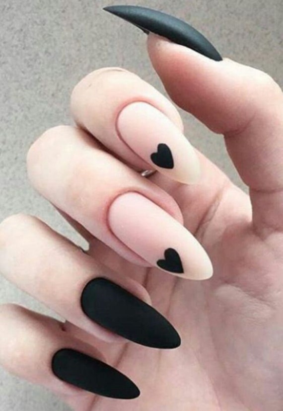 black nails with heart design