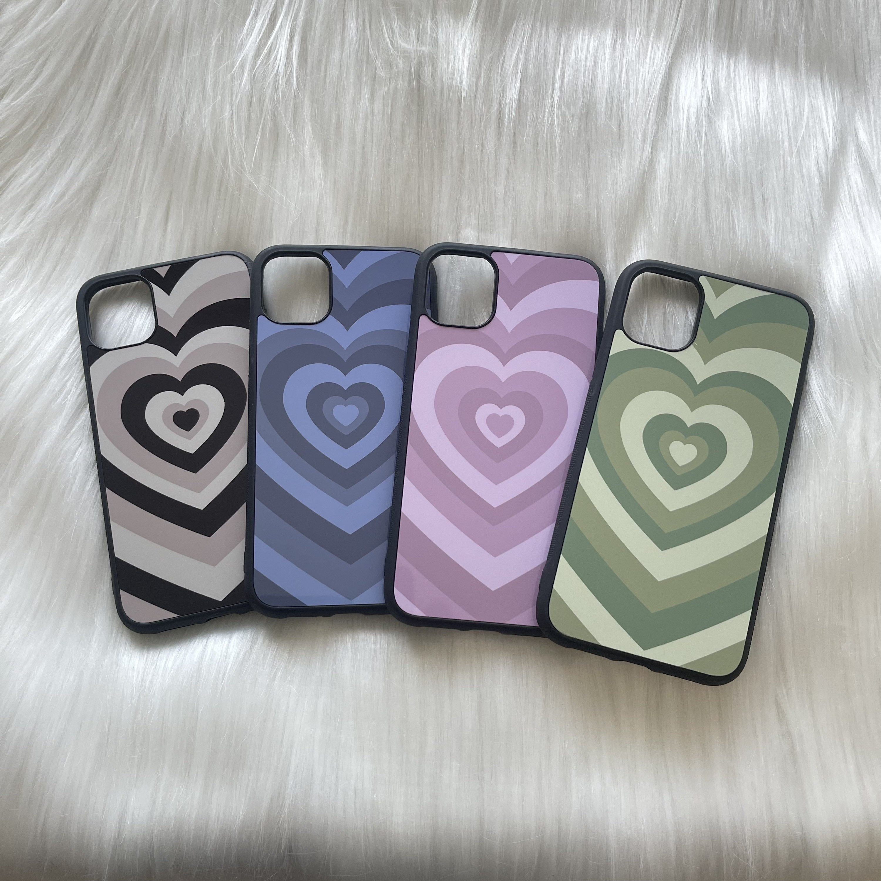 Noisy May iPhone 12 phone case with phone charm in blue heart