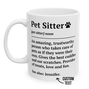 May include: White ceramic mug with the text "Pet Sitter" and a paw print graphic. The mug includes a definition of a pet sitter and the words "CUSTOM TEXT". A great gift for pet sitters.
