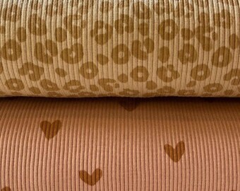 Tejido de punto canalé estampado, diseños neutros para bebés y niños / 94 % algodón, 6 % licra / 135 cm de ancho