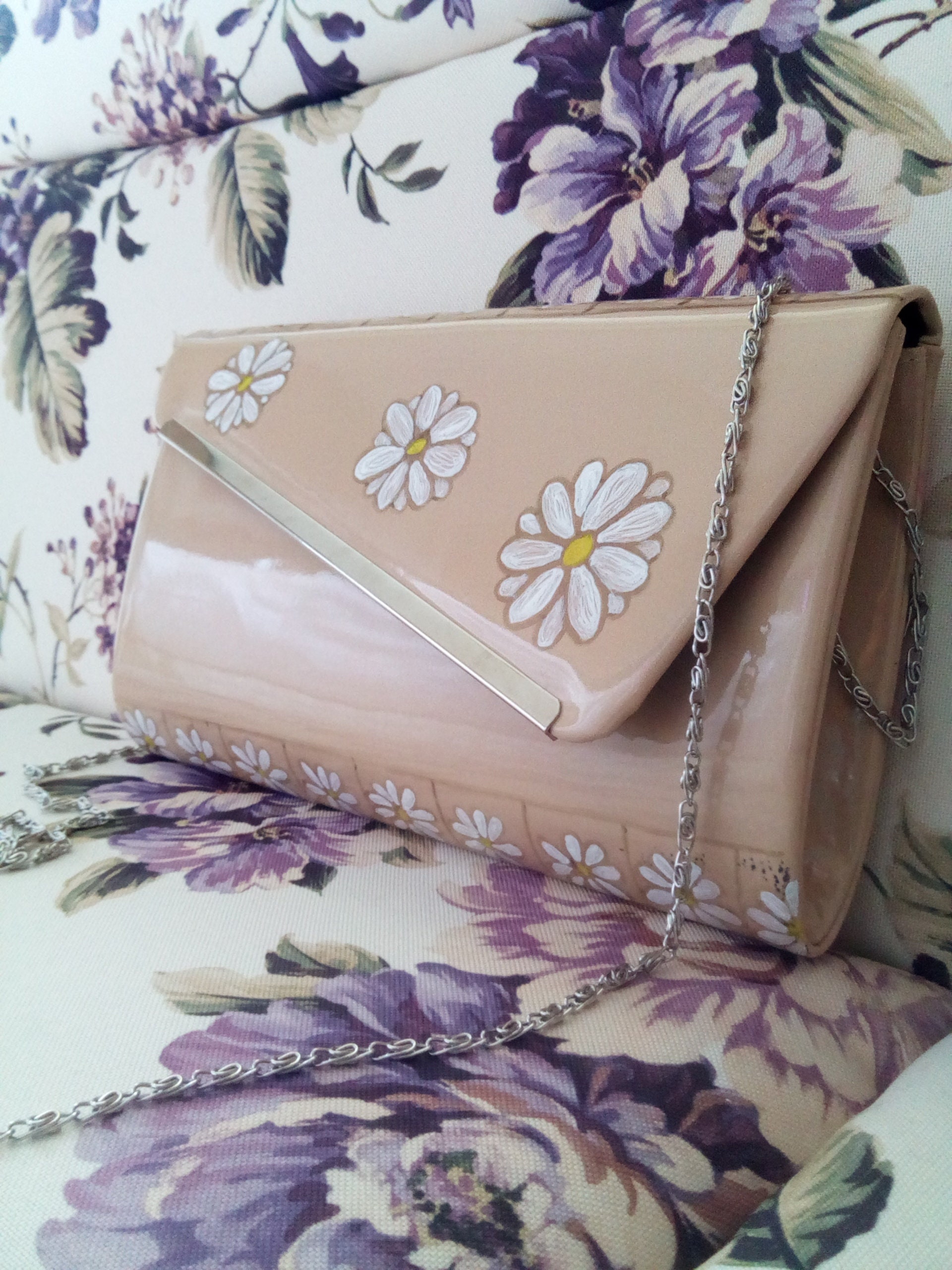 beige patent leather clutch