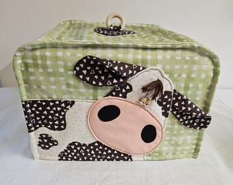 4 slice toaster cover. Approximately 11.5 x 10.75 x 8 inches tall
