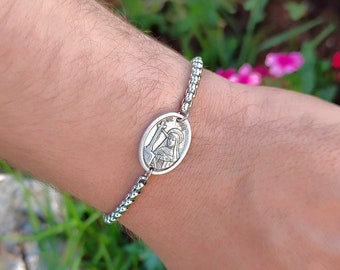 Catholic Saint Medals St Rita Baseball Charm On A 8 Inch Round Double Loop Bangle Bracelet Catholic Saint Medals St Rita Baseball Charm On A 8 Inch Round Double Loop Bangle Bracelet