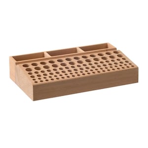 May include: Wooden organiser with a grid of small holes for storing small items, such as paint tubes or markers. The organiser has three separate compartments on the top.