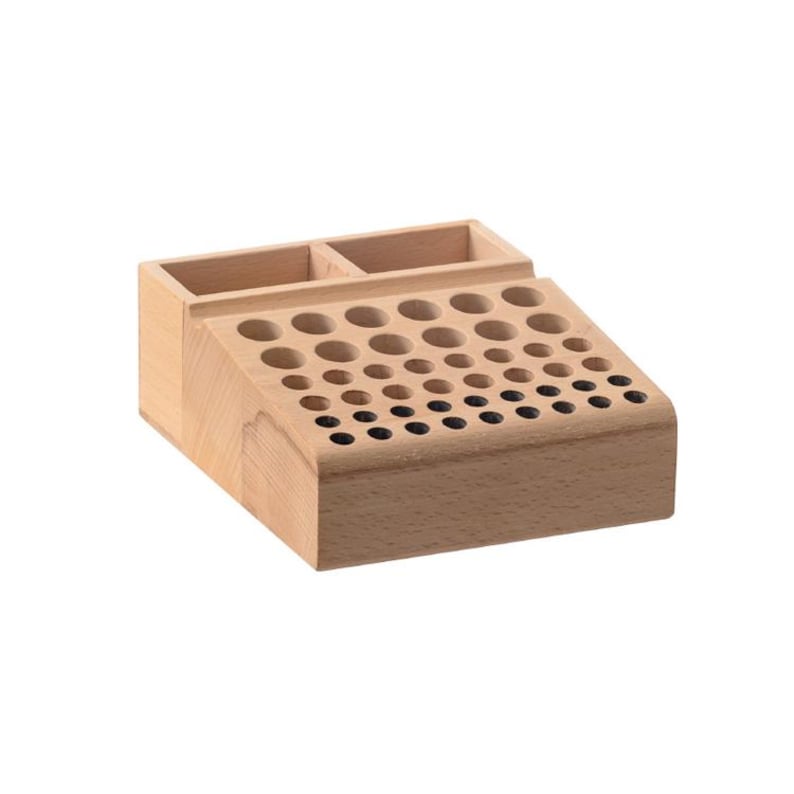 May include: Wooden organiser with multiple compartments for storing small items. The organiser has a large section with a grid of holes for holding pens, pencils, or other writing utensils. There is also a smaller compartment for storing other items.