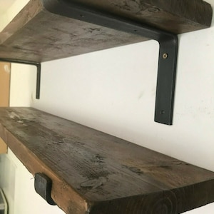 Rustic shelves Handmade from recycled scaffold boards comes With 2 industrial metal shelf brackets. 22.5cm deep 3.5cm thick wall décor