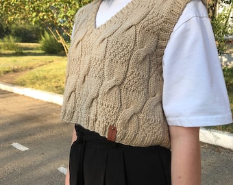 beige sweater vest