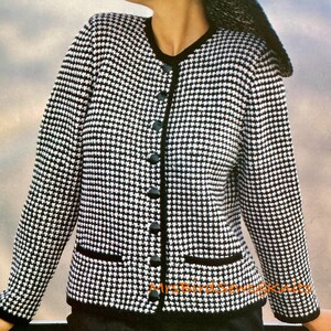 May include: Black and white houndstooth jacket with black trim and buttons. The jacket has a V-neck and two front pockets. The image also shows a matching hat and earrings. The text in the image reads "81-102 cm 32-40 in. Five sizes."