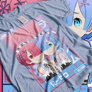 May include: Pale blue t-shirt with a graphic of two anime characters with pink and blue hair. The design includes Japanese text and the words "RAM / REM" and "Re:ZERO". A tag on the shirt reads "LARGE".