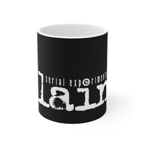May include: Black ceramic mug with a white graphic that says "serial experimental lain" in a stylized font.