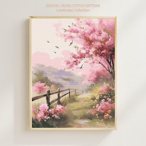 May include: A framed cross-stitch landscape featuring a serene scene with pink flowering trees, a wooden fence, and a path. The artwork includes text at the top: "DIGITAL CROSS STITCH PATTERN Landscape Collection". The color palette is soft, with shades of pink, green, and purple.