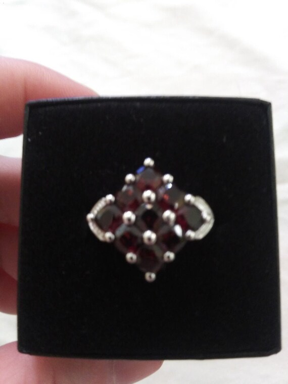 Genuine Ladies Garnet Cluster Ring Set In Sterling Silver