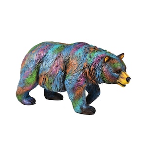 May include: A colorful, abstractly painted bear figurine. The bear is standing on all fours and is facing to the right. The bear is painted in shades of blue, green, orange, and purple.