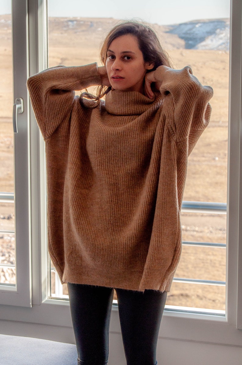 Stay Cozy in Style: The Turtleneck Tunic Sweater in Organic Cashmere and Wool and Modal image 1