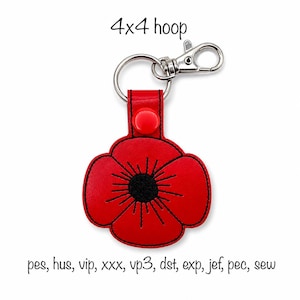 May include: A red poppy flower keychain with a black centre, featuring a silver metal lobster clasp and a split ring. The text 4x4 hoop is at the top, and the text pes, hus, vip, xxx, vp3, dst, exp, jef, pec, sew is at the bottom.