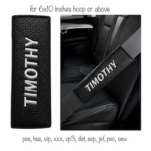 May include: A black textured seat belt cover featuring the embroidered white name TIMOTHY. The text for 6x10 inches hoop or above and file formats pes, hus, vip, xxx, vp3, dst, exp, jef, pec, sew are included in the image display.