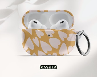 May include: A yellow and white heart patterned case for AirPods with a carabiner clip. The case is open and the AirPods are visible inside. The brand name "CASULO" is printed on the bottom of the image.
