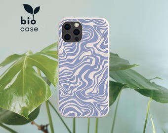 May include: A phone case with a light blue and off-white marbled wavy pattern. The case features a speckled texture and a camera cutout. The text bio case is printed in black with a small black leaf icon above the word bio in the upper left corner.