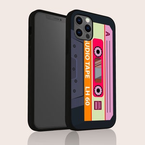 May include: Black phone case with a retro cassette tape design. The case features a pink and orange cassette tape with the text "AUDIO TAPE LH 60" and the letter "A" on the top right corner.