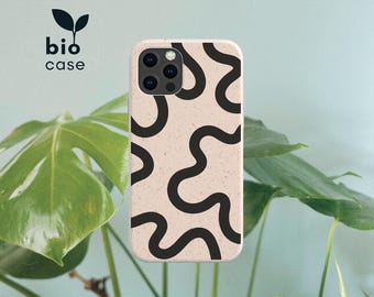 May include: A phone case with a speckled beige base and a black wavy line pattern. The case features a triple camera cutout on the top left. The text "bio case" with a small leaf icon is positioned above the phone case in the upper left corner.