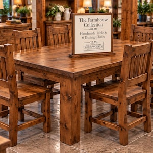 May include: A rectangular wooden dining table with six matching chairs, all featuring a dark brown stained finish and visible wood grain. A rectangular sign on the table reads The Farmhouse Collection, Handmade Table & 6 Dining Chairs, TLW The Lincolnshire Woodworker.